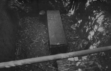 A Digger checking one of eight "in ground" operating theatres near the wards at the NVA/VietCong K76A Hospital.