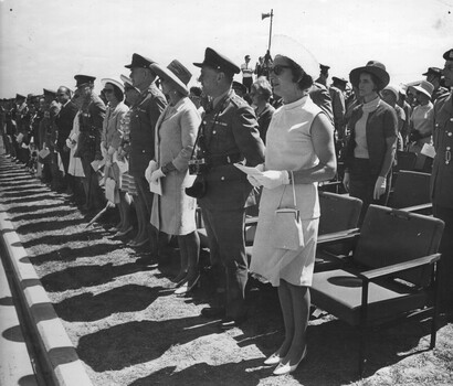 A photograph taken in Townsville o the18/08/1968. with some of the guests at Trooping the 6 RAR Colour. 