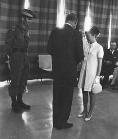 A photograph a Townsville  18/08/1968. The Prime Minister of Australia, the Right Honourable John Gorton presents an emblem of the United States Presidential Unit Citation.