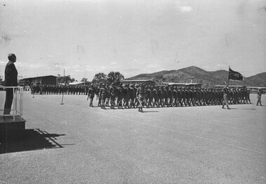 In Townsville, The Trooping of the 6 RAR Colour past the Prime Minister The Right Honourable John Gorton MP. The Colour.