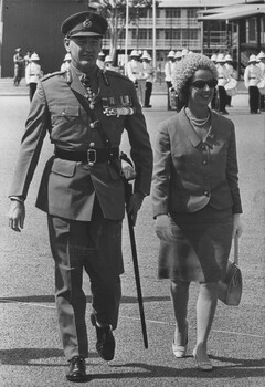 Maj Gen FG Hassett, CBE, DSO, MVO accompaniedby his wife, arrive to attend the Trooping of the Regimental Colour.