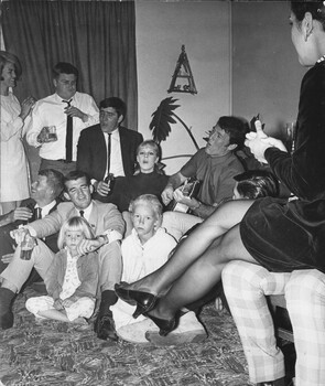  Townsville, 18/08/1968, Rock and Roll stars Little Patty and Col Joye entertain in the lounge room of a private home.