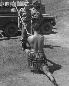 A photograph of 1st Australian Task Force Commander, Brig C.M "Sandy" Pearson, accompanied by the New Zealand Padre Varcoe of 4 RAR/NZ. 