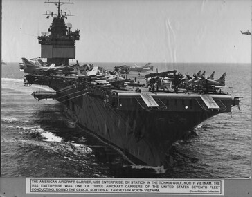 A photograph of the American Aircraft Carrier USS Enterprise on station in the Tonkin Gulf North Vietnam. 