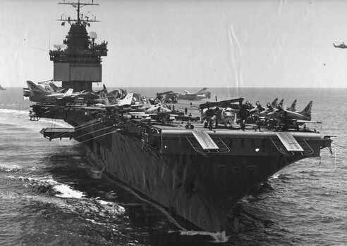 A photograph of the American Aircraft Carrier USS Enterprise on station in the Tonkin Gulf North Vietnam. 