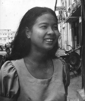 A photograph of a Bar Girl from the Melody Bar in Ngo Duc Ke Street Saigon, next door to the United Press International in Saigon.