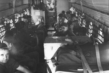 A photograph of US servicemen along with their belongings are transported to Ton Son Nhut International Airport Saigon from their Mekong Delta Base. 