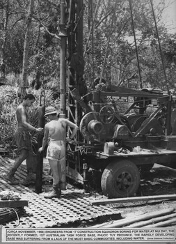 A photograph of Engineers from 17 Construction Squadron boring for water at Nui Dat, the recently formed 1st Australian Task Force Base.