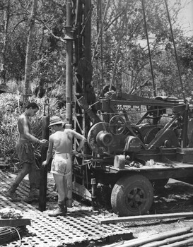 A photograph of Engineers from 17 Construction Squadron boring for water at Nui Dat, the recently formed 1st Australian Task Force Base.