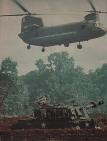 A photograph of a US Army CH47 Chinook helicopter carries ammunition and supplies to A Battery 2/35th US Artillery attached to the Australian Artillery Regiment.