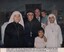 A photograph of Johnny O'Keefe took time out from his concert program to vist the orphans and their caring nuns at the An Phong Orphanage.