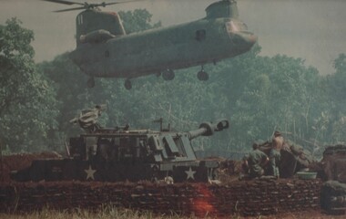 A US Army CH47 Chinook medium helicopter carries ammunition and supplies to A Battery 2/35th US Artillery. 