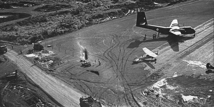 First Australian Task Force Base, Luscombe Airfield, a Royal Australian Air Force Caribou from 35 Sqn 'Wallaby Airlines' unloads passengers. 