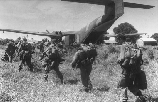A RAAF 35 Squadron Caribou transport aircraft, after landing in a paddock outside of the Vietnamese village of Xuyen Moc. 