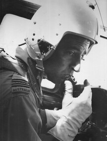The pilot of this particular 005 mission, F/Lt Nick Watling at the controls of the No.35 Squadron Caribou over the Mekong Delta. 