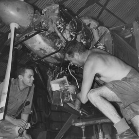 2Lt Tom 'Rockets' Guivarra Mid, a fixed wing pilot with 161 (Indep) Recce Flt checks with a maintenance technician during routine maintenance. 