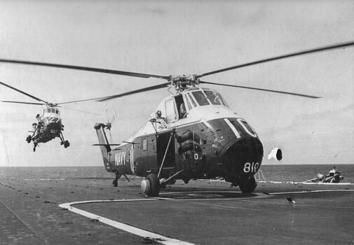 Two Australian Navy Wessex helicopters return to the flight deck of the "Vung Tau Ferry" HMAS Sydney after completing anti-submarine sweeps. 
