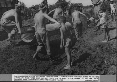 Photograph, Laying Drainage Pipe
