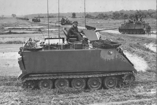 A command Armoured Personnel Carrier of A Squadron, 3rd Cavalry Regiment, 1st ATFstands guard as the American 11th Armoured Cavalry moves through the Province.