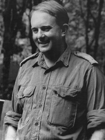 Major Mike Crawford Commander of 104 Battery Royal Australian Artillery at Fire Base Betty, responds with a smile to a comical incident. 