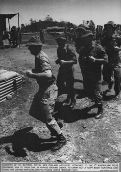 Several soldiers running on the parade ground  