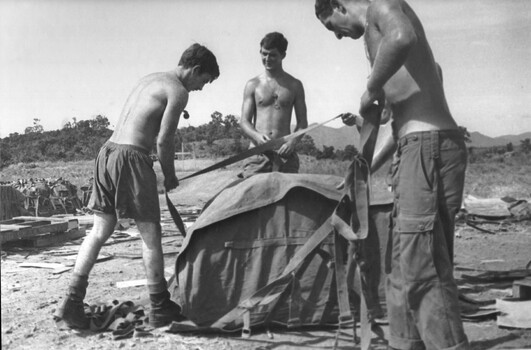 A photograph of Gunners of 1st Field Regiment,  RAA, at the 1ATF Base, Nui Dat, Phuoc Tuy Province, Sth Vietnam. 