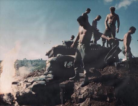 A photograph of Australian Gunners with an Artillery Battery located at the 'Horseshoe Feature' Phuoc Tuy Province, South Vietnam. 