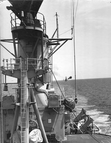 A photograph of the destroyer HMAS Hobart under the command of Capt Guy Griffiths with American destroyers attached as a flotilla. 