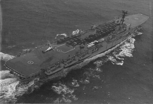 A photograph of the fully laden Vung Tau Ferry" HMAS Sydney containing 9RAR vehicles and equipment, making way towards Vung Tau. 