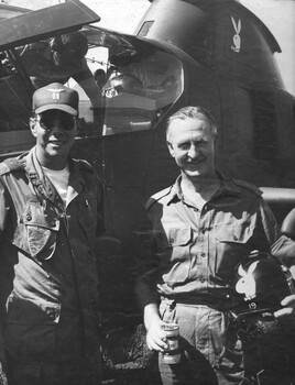 A photograph of 1st ATF Commander Brigadier Ron Hughes standing beside the Commanding Officer Captain Ken Rubin 'Pappy Rabbit' Playboy 16.