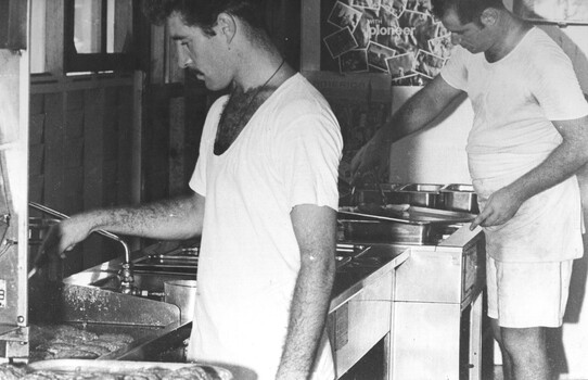 A photograph of the kitchen at the1st Australian Field Hospital, Vung Tau, Cooks from the Royal Australian Army Catering Corps prepare the evening meal. 