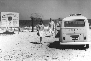 A photograph of Diggers returning to the Red Cross Combi Van for the drive back to the 1st Australian Field Hospital, Vung Tau. 