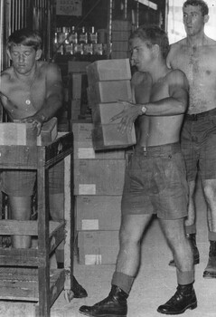 A photograph of three Diggers of the 1st Australian Field Hospital, Vung Tau stores section, preparing requistioned items for issue to the hospital. 