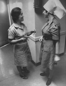 A photograph of Captain Pam West and Mary Gaynor, from the 1st Australian Field Hospital, Red Cross Unit, Vung Tau