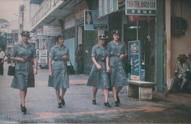 A photograph of  Lt Terrie Roche,  Capt Amy Pittendreigh, Lt Colleen Mealey and Lt Margaret Ahern, having a shopping trip in Vung Tau. 