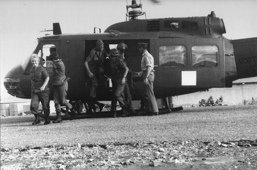 A photo of Lt Col Mike Naughton and some of his nursing staff, Matron Maj Nell Espie, Lt Ann Wright and Capt June Minchow. 