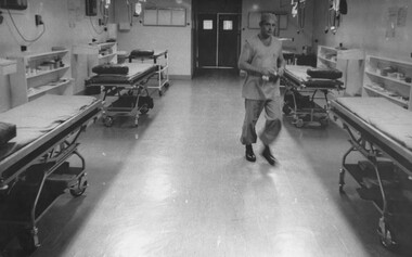 A photogaph of Medic Cpl Peter Whittle at the1st Australian Field Hospital checking the empty triage for incoming casualties. 