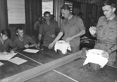 A photograph of the drawing the $1000 Melbourne Cup Sweep 1969  by L/Cpl Hunter, Cpl Morrow, WO1 Londs, NZ Padre Shaw and Maj Stewart.