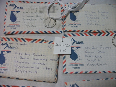 Four envelopes with red and blue stripes around the edging addressed to Miss Sue Richards