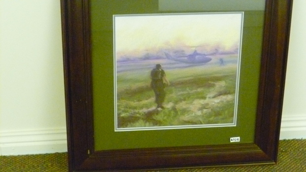 the picture depicts two soldiers walking toward a helicopter. The picture is in a timber frame with matt green 