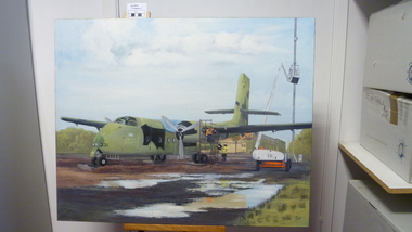 Painting, Mike and Rod working on the Caribou