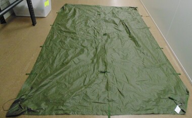 An army issue waterproof wet weather sheet.