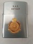 A silver flip-top Vulcan cigarette lighter personalised with inscriptions on the front R.A.E Vietnam and the Royal Australian Engineers coat of arms in gold.