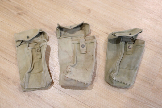 Three rectangular brown canvas pouches with gusset sides. Closure is a flap and metal stud.