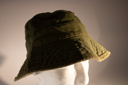 Khaki green standard army issue bush hat.