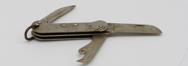 A multi functional tool with two blades and a can opener. 