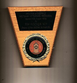 A VVAA Melton Vic wooden plaque commemorating the opening by Tim Fischer MP of the Melton Vietnam Veterans Memorial 19 August 1998