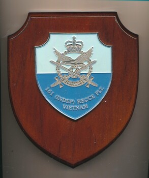 Wooden shield bearing the blue emblem of 161 Reconnaissance Flight, Vietnam