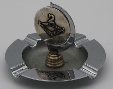 Standard electro plated ashtray mounted with medallion to 2 recruit training battalion with the number 2 over pair of boomerangs