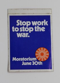 A small blue and white sticker used by demonstrators during the moratorium against the Vietnam conflict.   